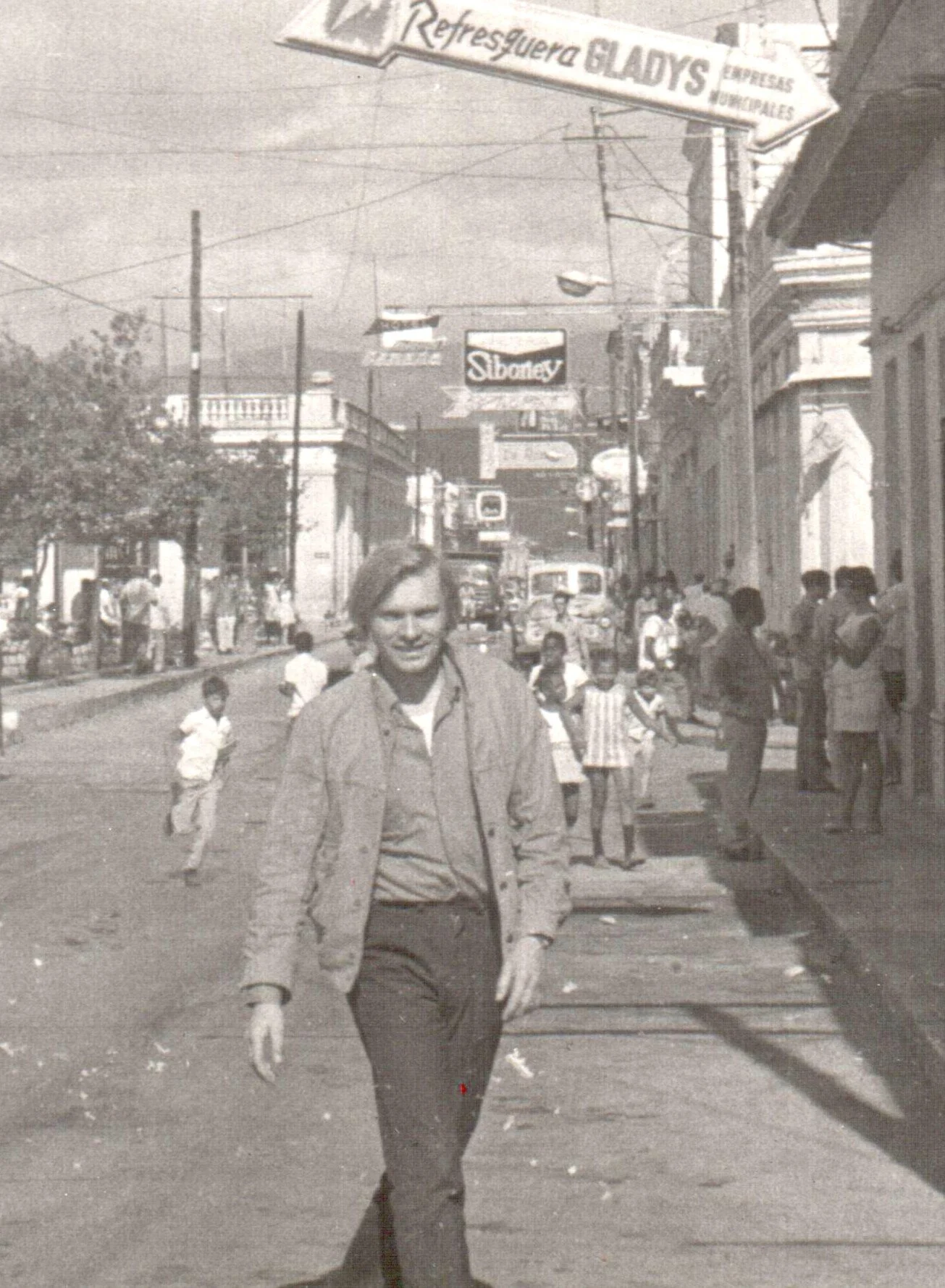 Oleg Vidov walking down a street