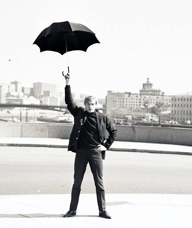 Oleg Vidov with an umbrella on an empty embankment